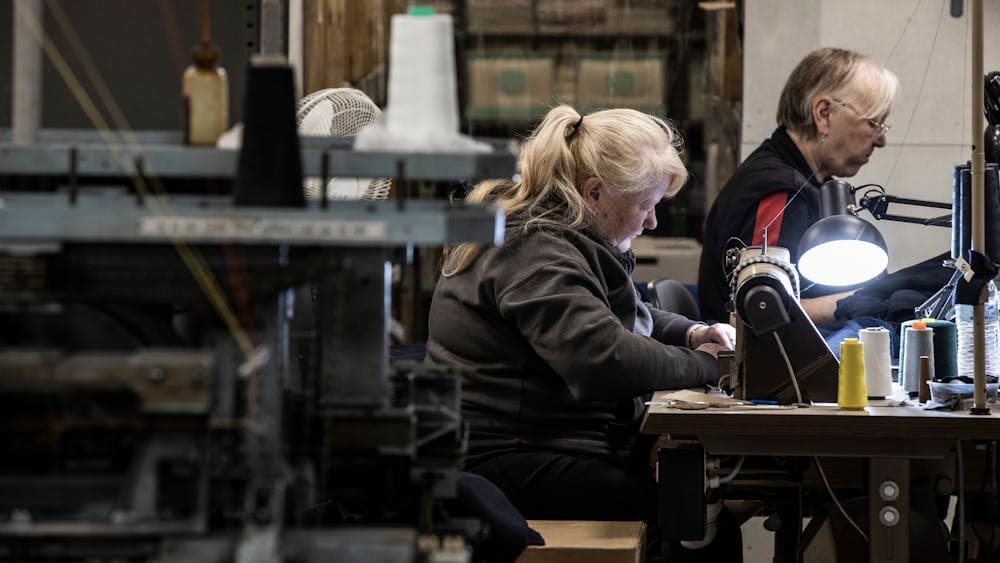 Hand-finishing jumpers in the factory