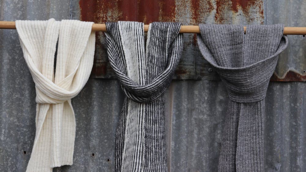 Picture shows three scarves hanging