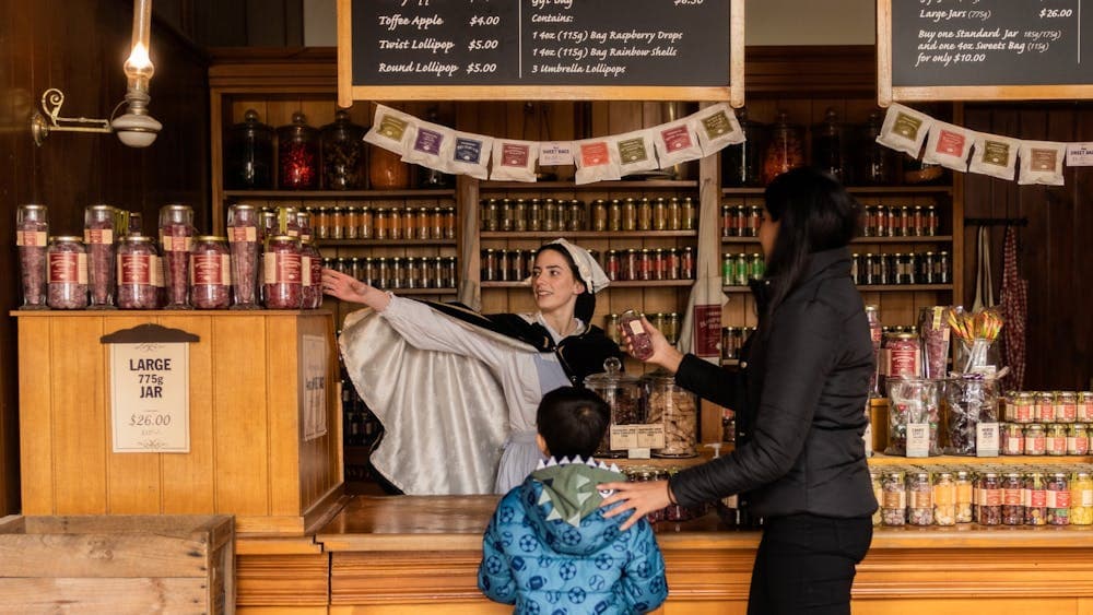 Mother and son inside Sovereign Hill confectionary store