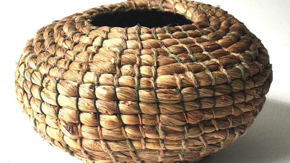 Coiled fibre basket