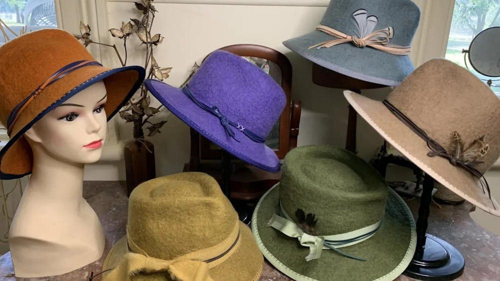 Collection of six wet felt hats in different colours