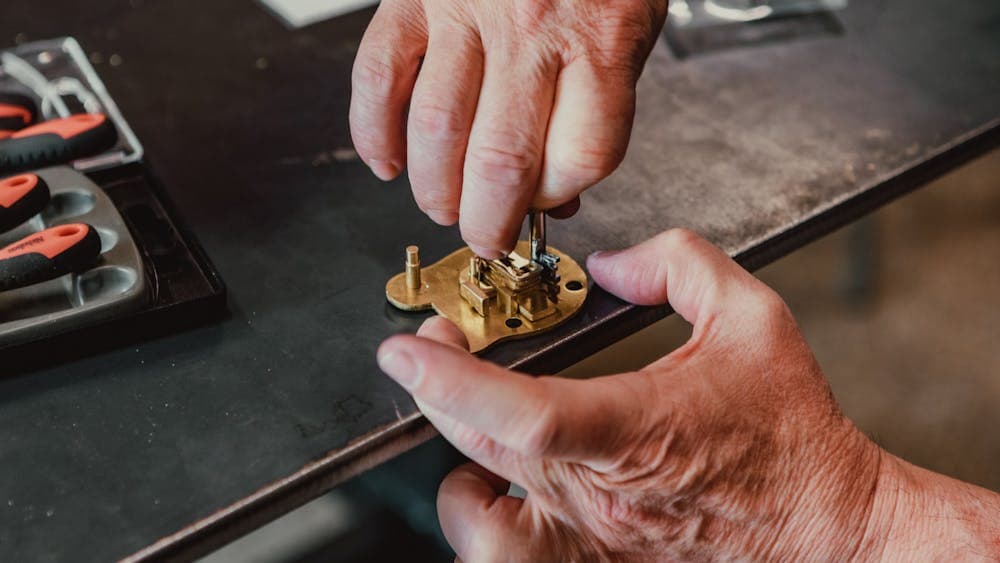 Pair of hands making a lock