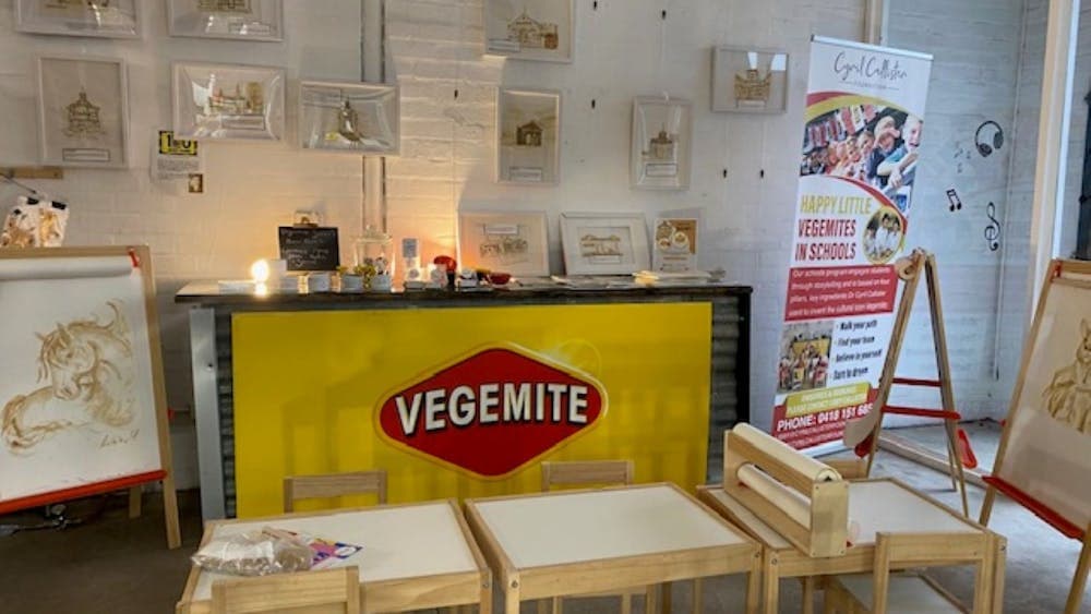 A display of the set up for Vegemite painting workshop for kids.