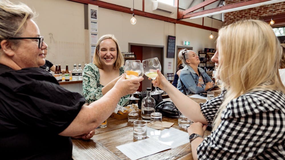 Three ladies enjoying a drink