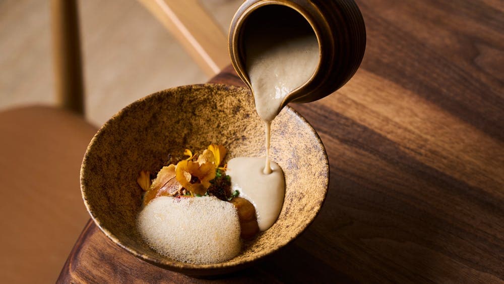 Soup with mushroom foam, Jerusalem artichoke crisps, caramelised onion and a chestnut puree