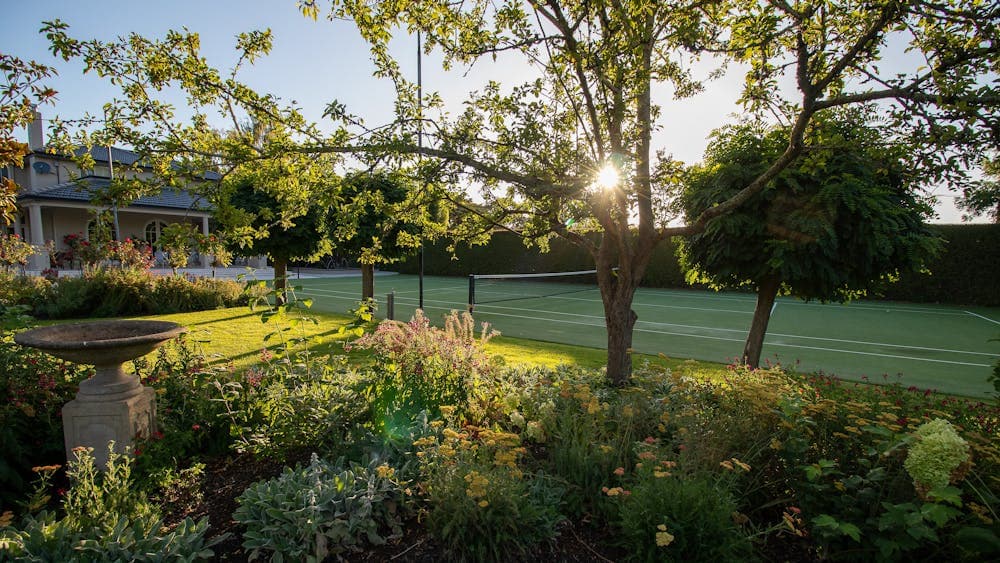 Open Gardens Victoria - The Oaks, view across garden towards tennis court