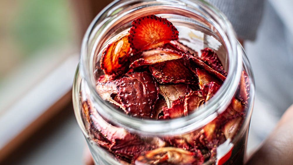 Strawberries packed in a jar