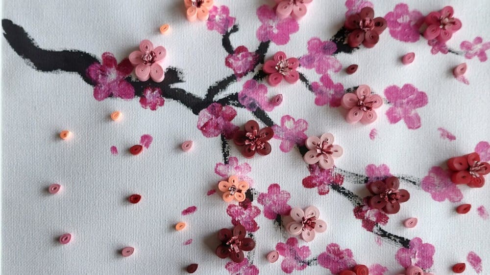 Cherry blossom quilling design on white paper