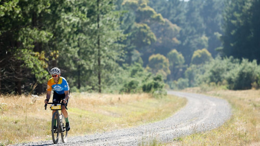 A lone rider enjoying the calm surroundings as they ride in the 100km event