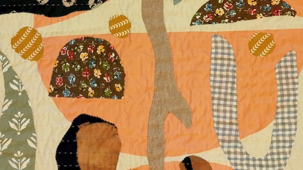 Mel Young hand-quilted cloth collage