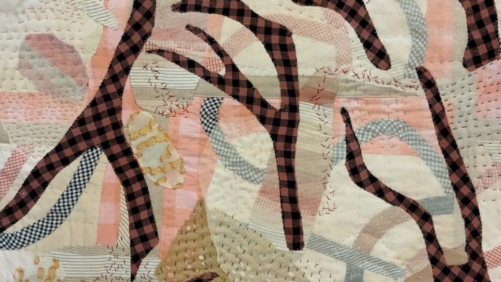 Mel Young Hand-stitched cloth collage