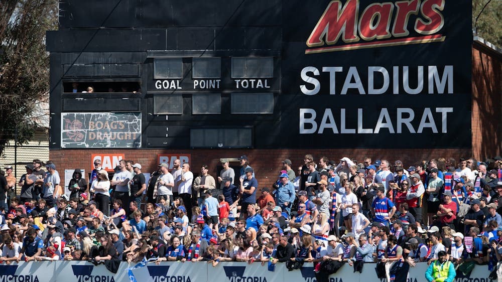 Mars stadium with a crowd cheering