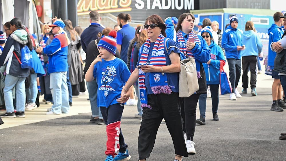 Crowds in Western Bulldogs merchandise.