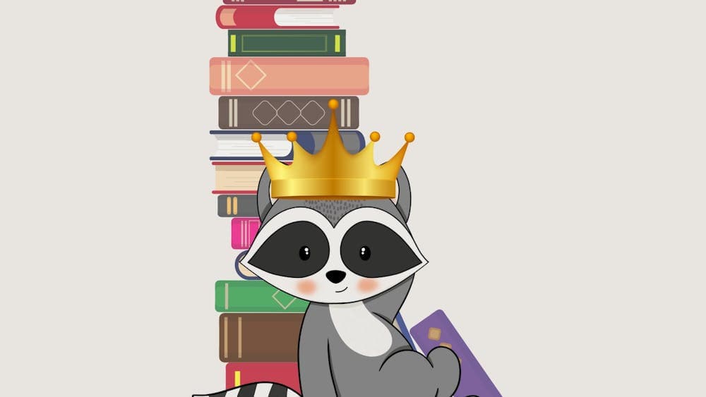 Logo with racoon mascot wearing a crown, leaning on a stack of books