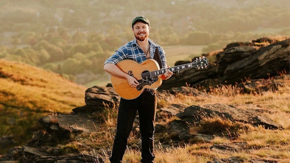 portrait of musicial with guitar