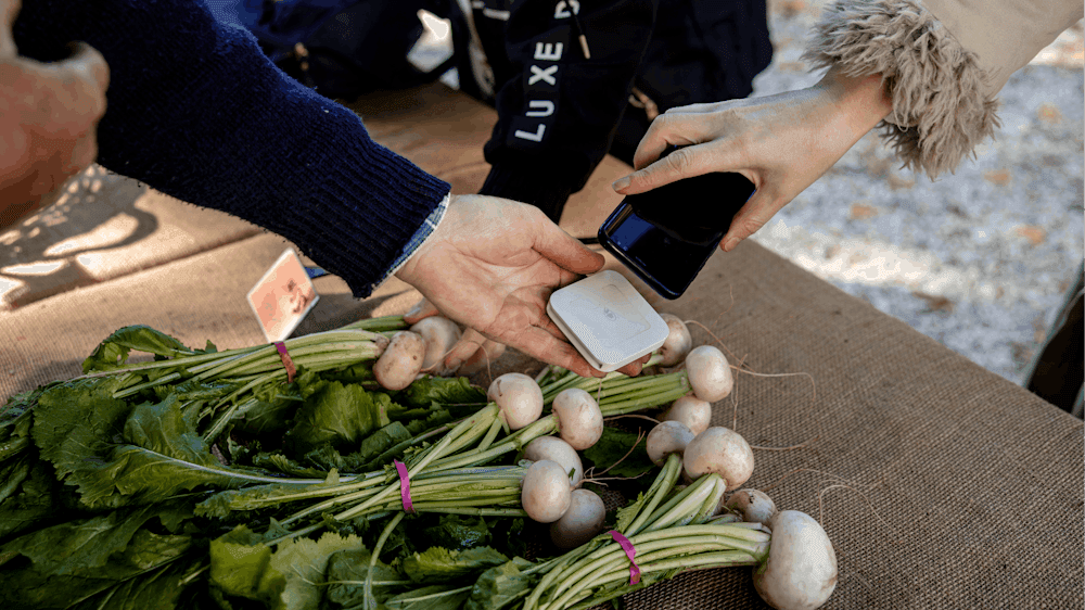 The buyer is paying is using their mobile phone