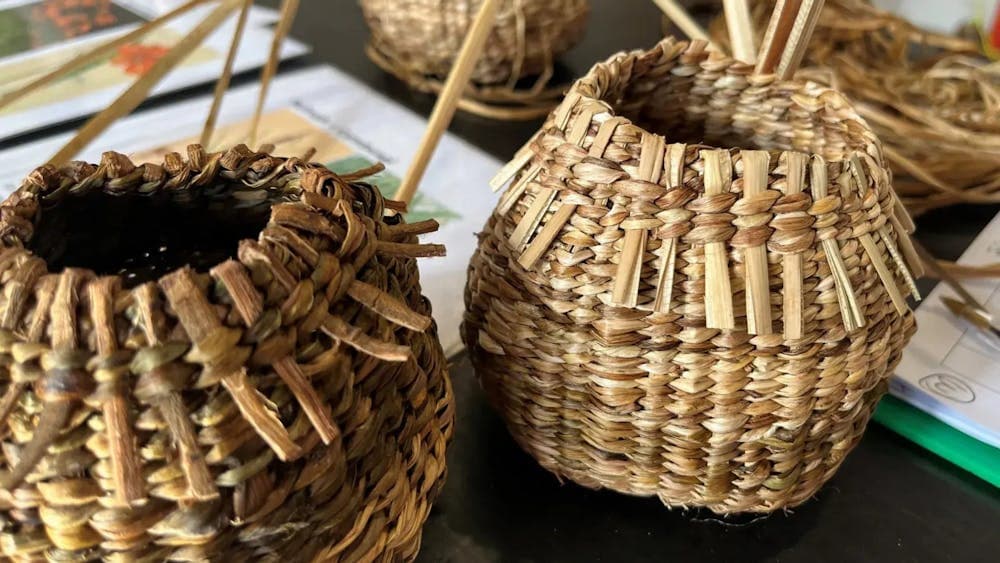 Two small twined baskets